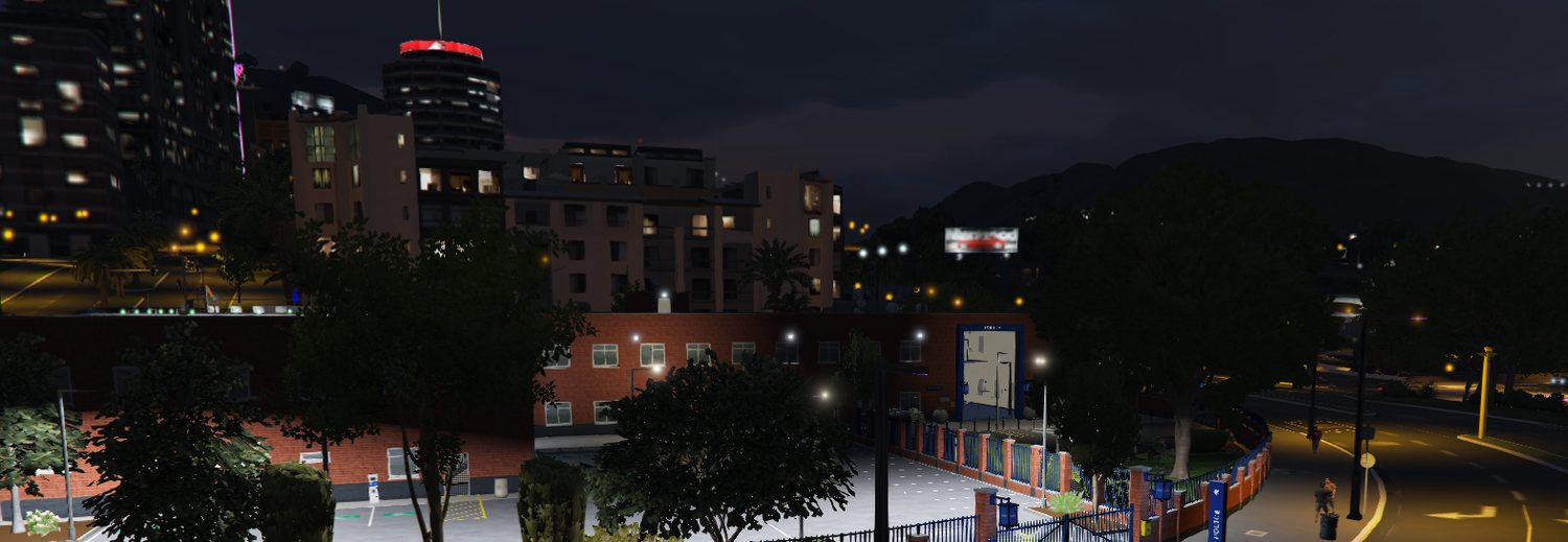 The Met-style police station at night